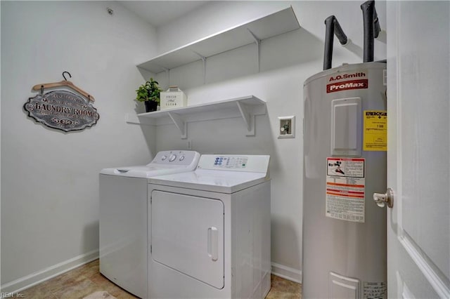 washroom featuring electric water heater and separate washer and dryer