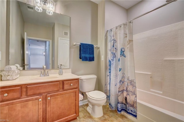 full bathroom featuring shower / bath combo, vanity, and toilet