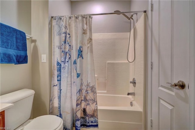 full bathroom featuring shower / bath combo with shower curtain, vanity, and toilet