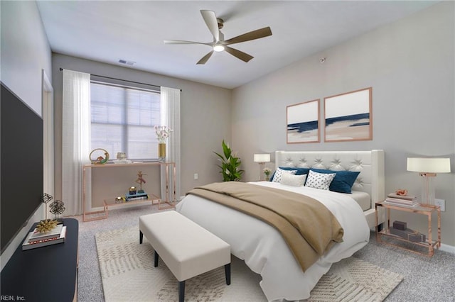 bedroom with ceiling fan and carpet floors