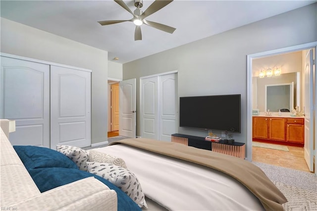 bedroom with connected bathroom and ceiling fan