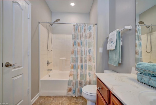 full bathroom with vanity, toilet, and shower / tub combo