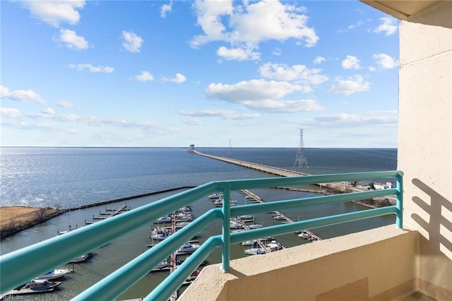 balcony featuring a water view