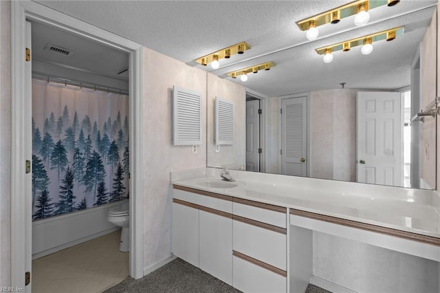 full bathroom featuring vanity, toilet, a textured ceiling, and shower / tub combo with curtain