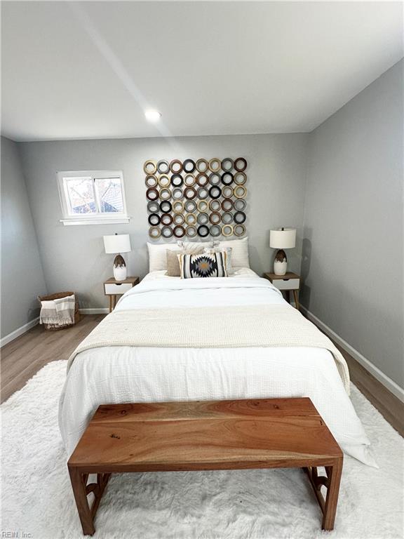 bedroom featuring hardwood / wood-style floors