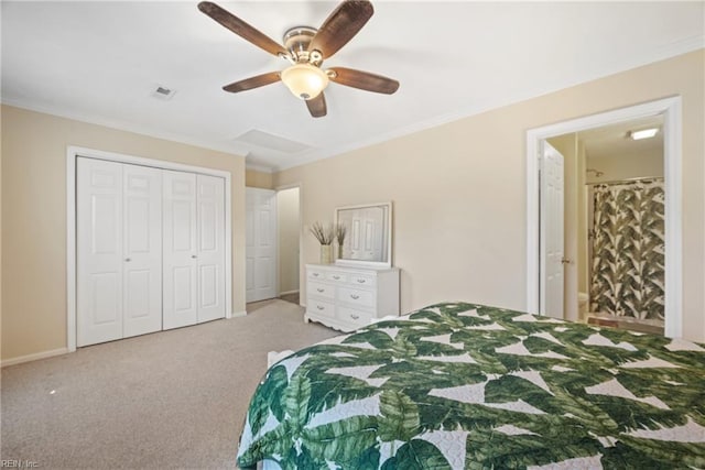 bedroom featuring ceiling fan, a closet, light colored carpet, and ornamental molding