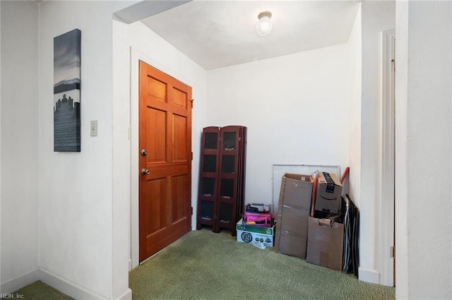 corridor featuring carpet floors