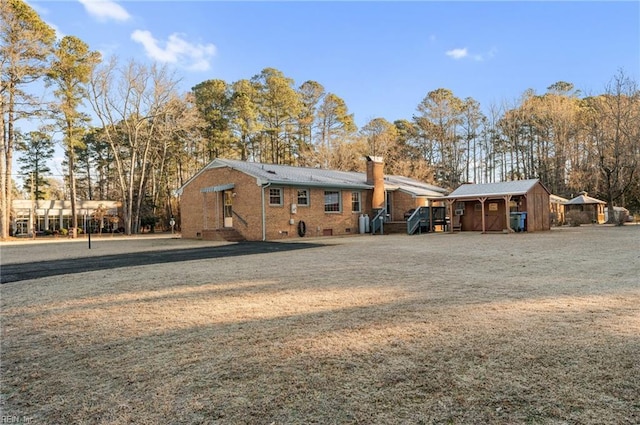 exterior space with a storage shed