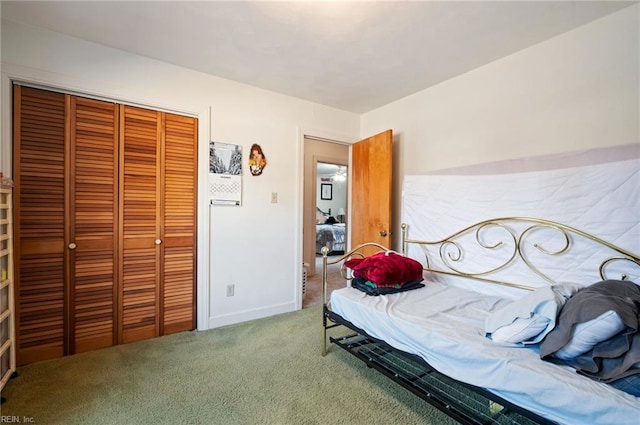 carpeted bedroom featuring a closet