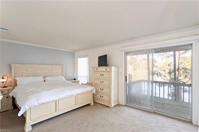 carpeted bedroom featuring access to exterior, crown molding, and multiple windows