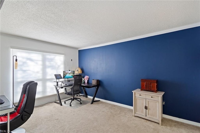 carpeted office space featuring a textured ceiling and ornamental molding