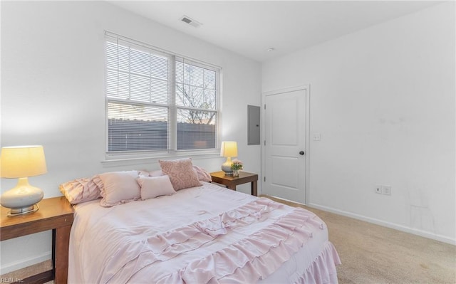 bedroom featuring carpet and electric panel