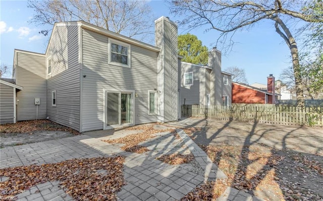 back of house featuring a patio area