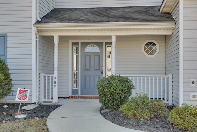 entrance to property with covered porch