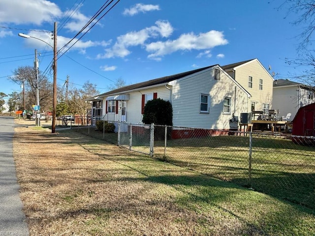 view of property exterior featuring a lawn