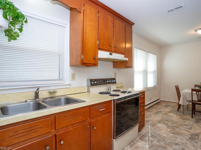 kitchen with electric range, sink, and a baseboard radiator