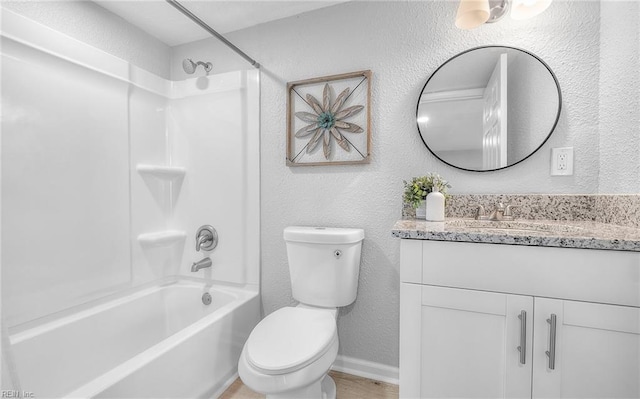 full bathroom featuring shower / washtub combination, vanity, and toilet