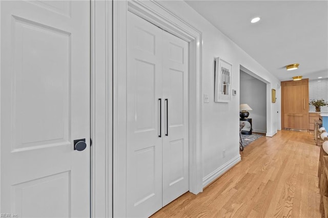 hallway featuring light wood-type flooring