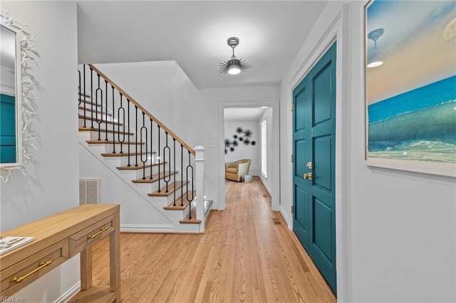 foyer entrance featuring light hardwood / wood-style flooring