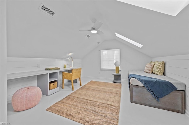 bedroom with ceiling fan and vaulted ceiling with skylight