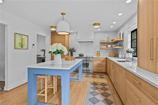 kitchen with decorative backsplash, custom exhaust hood, sink, pendant lighting, and stainless steel electric range oven