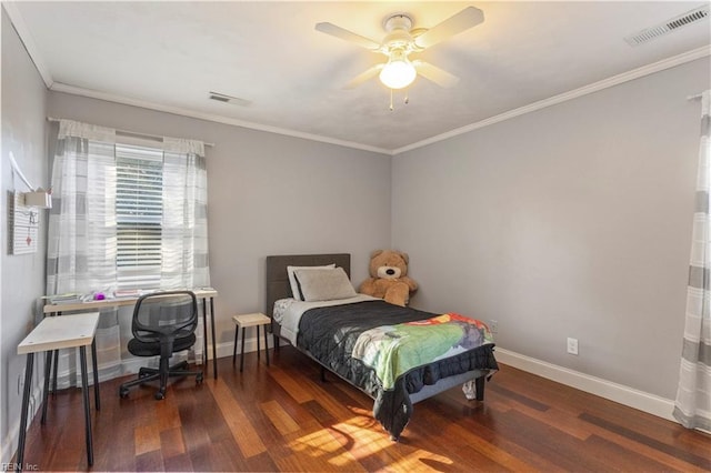 bedroom featuring ceiling fan, crown molding, and dark wood-type flooring