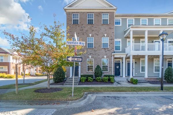 multi unit property featuring a balcony