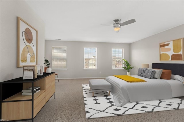 bedroom featuring ceiling fan and carpet floors