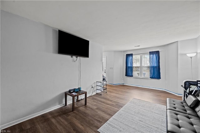 living room with hardwood / wood-style flooring