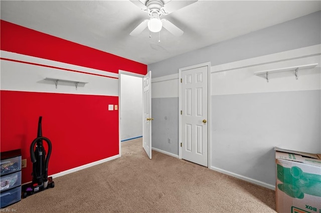 unfurnished bedroom with light colored carpet and ceiling fan