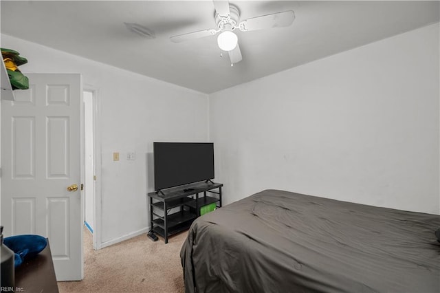 bedroom featuring ceiling fan and light colored carpet