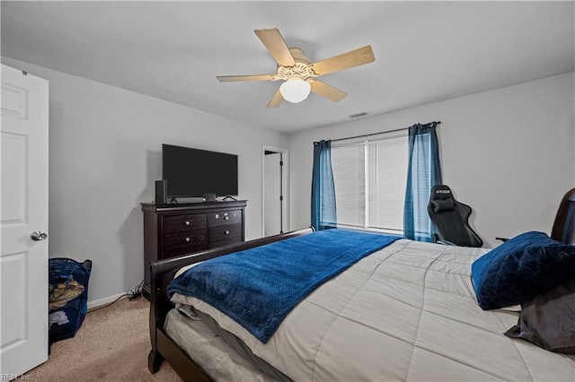 bedroom with ceiling fan and light colored carpet