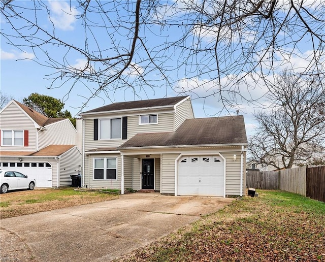 front facade featuring a front yard and a garage