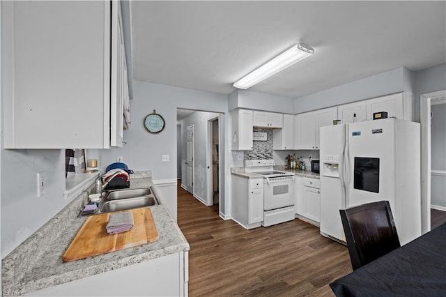 kitchen featuring white cabinetry, sink, dark hardwood / wood-style flooring, backsplash, and white appliances