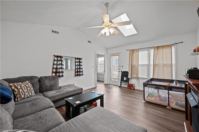 living room with dark hardwood / wood-style floors, vaulted ceiling, and ceiling fan