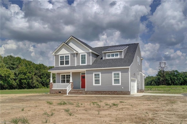 craftsman-style house with a porch and a garage