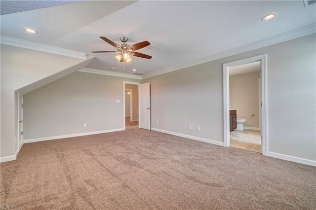 interior space featuring light colored carpet and ceiling fan