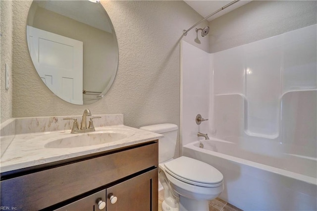 full bathroom featuring vanity, toilet, and shower / washtub combination