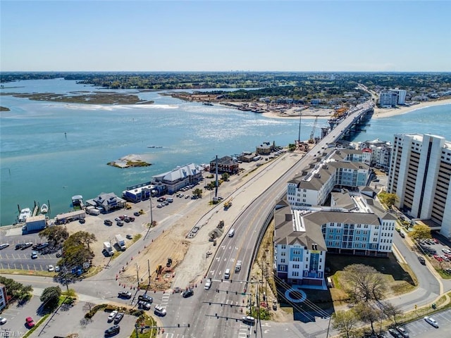 drone / aerial view with a water view