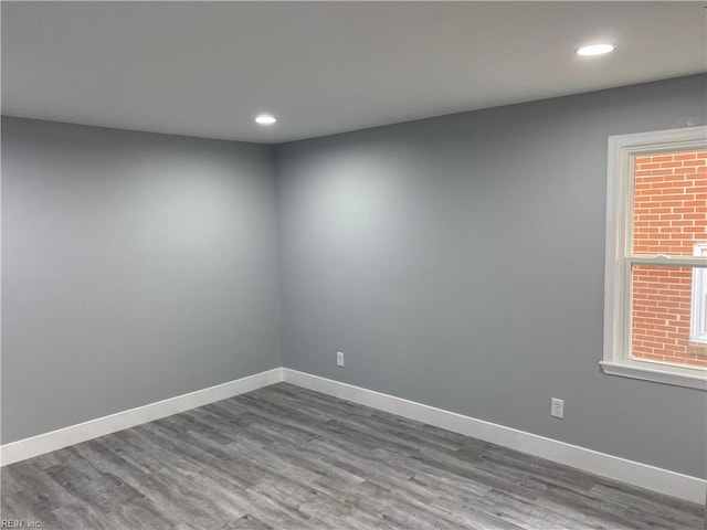 empty room featuring hardwood / wood-style floors