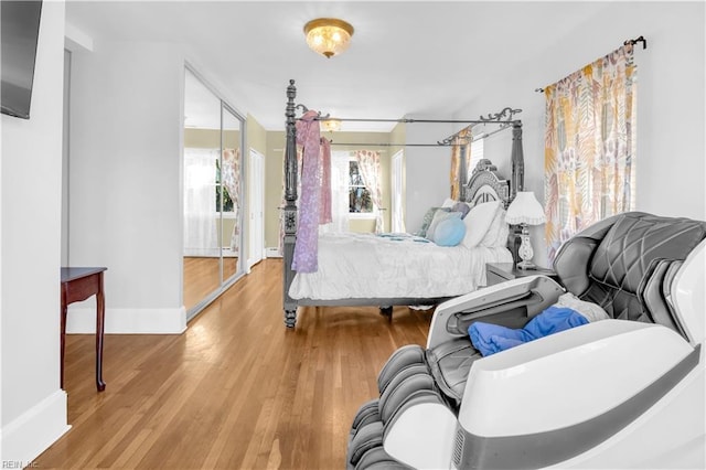 bedroom with wood-type flooring