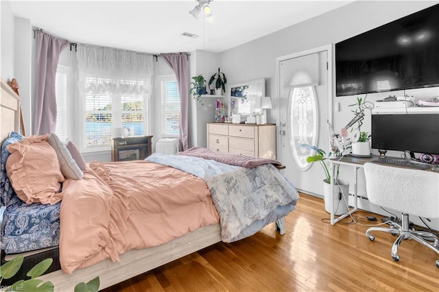 bedroom featuring light hardwood / wood-style floors