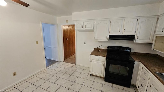 kitchen featuring black / electric stove, light tile patterned floors, white cabinets, and ceiling fan