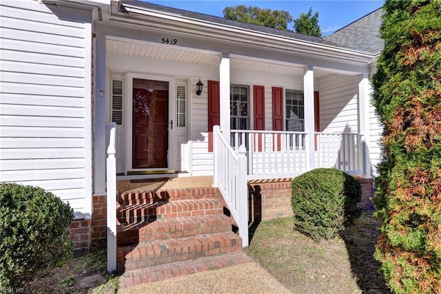 entrance to property with covered porch