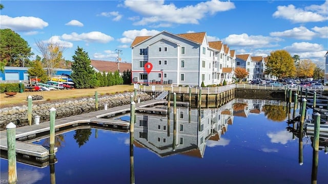 dock area featuring a water view