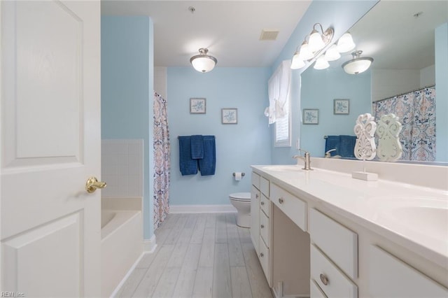 full bathroom with vanity, separate shower and tub, toilet, and wood-type flooring