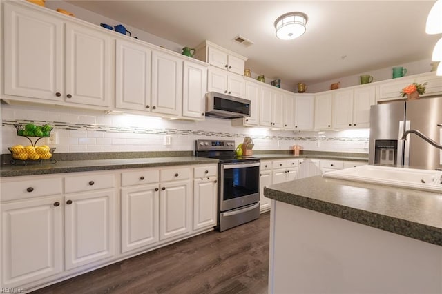 kitchen featuring white cabinets, dark hardwood / wood-style flooring, stainless steel appliances, and sink