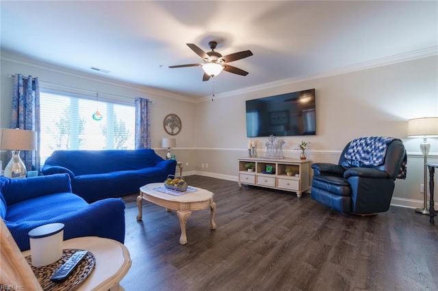 living room with ceiling fan, dark hardwood / wood-style flooring, and ornamental molding