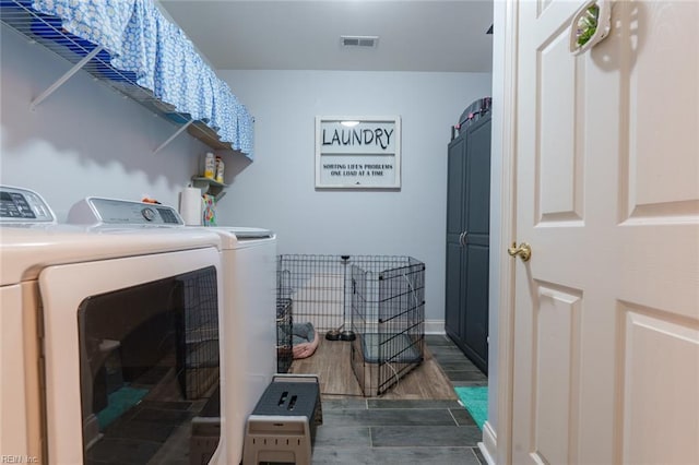 laundry area featuring washing machine and dryer