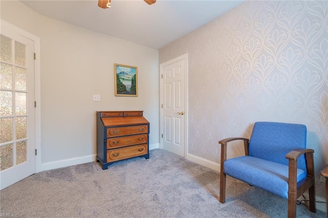 sitting room with light carpet and ceiling fan